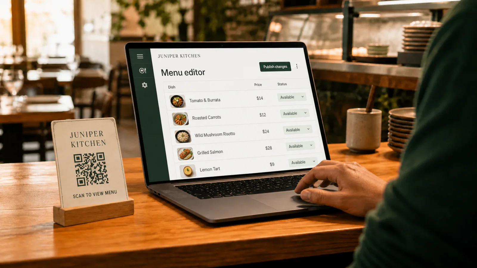 A restaurant manager editing a digital menu beside an existing QR table card